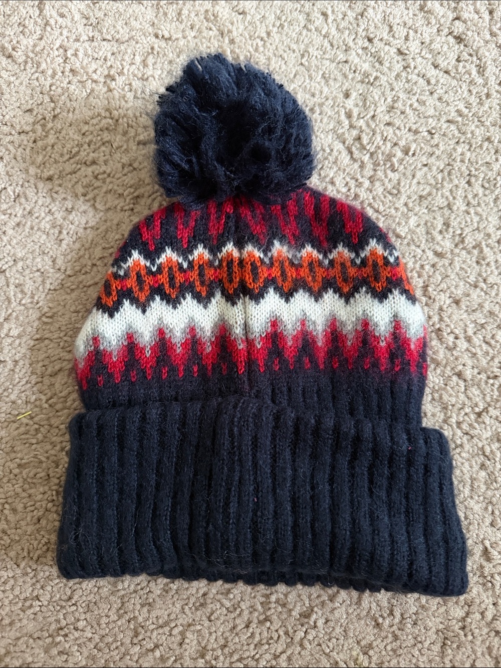 Topshop Navy Pom Beanie with Red, Orange & White Pattern